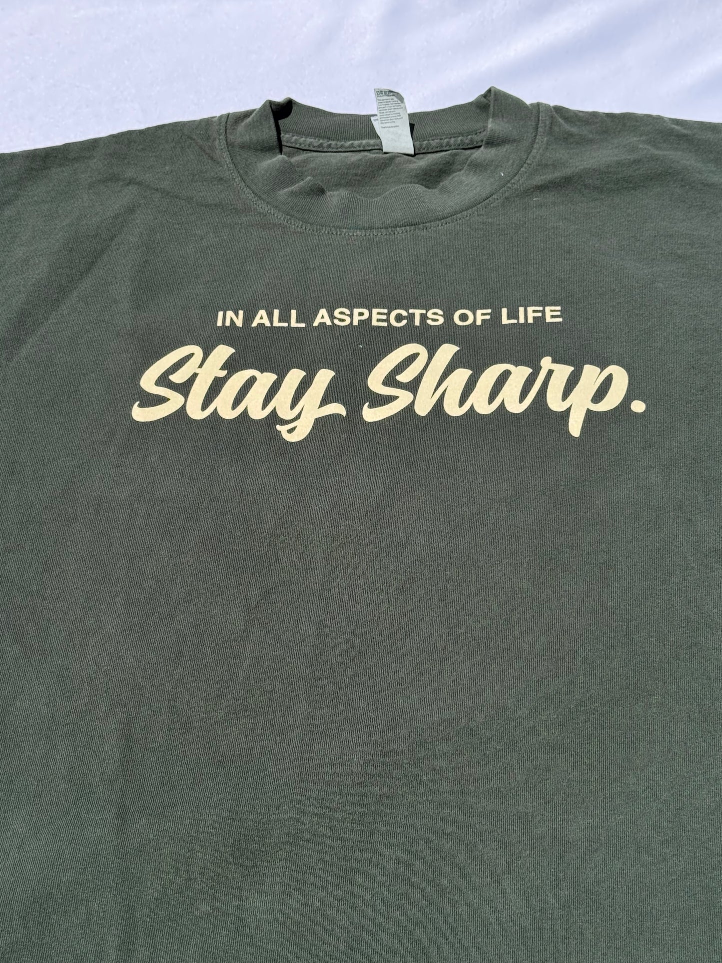 “In all aspects of life” Ivory Green T-Shirt